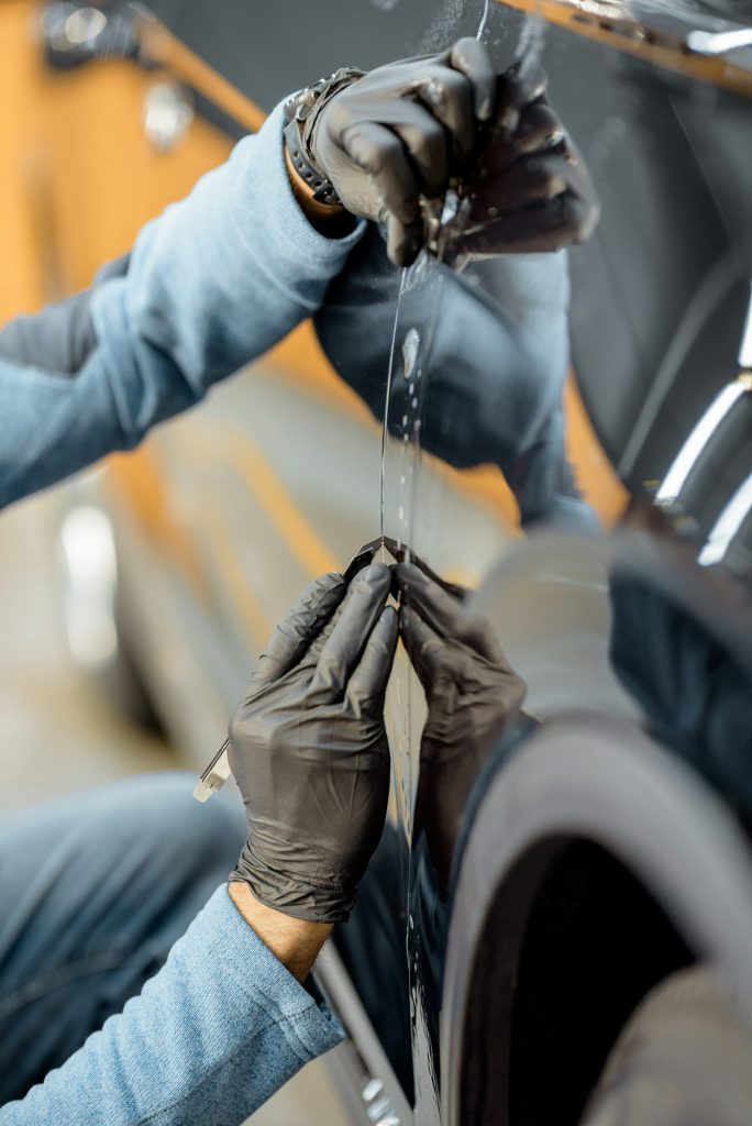 Filming car body at the vehicle service